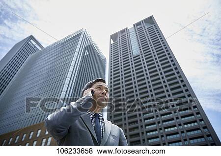 Japanese businessman downtown View Large Photo Image Stock Photo - Japanese businessman downtown. Fotosearch