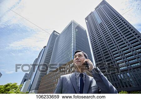 Japanese businessman downtown View Large Photo Image Stock Photo - Japanese businessman downtown. Fotosearch