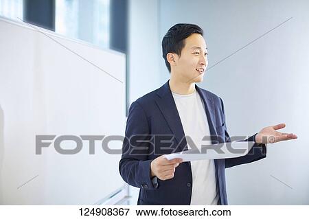 Japanese businessman in the office View Large Photo Image Stock Photo - Japanese businessman in the office. Fotosearch