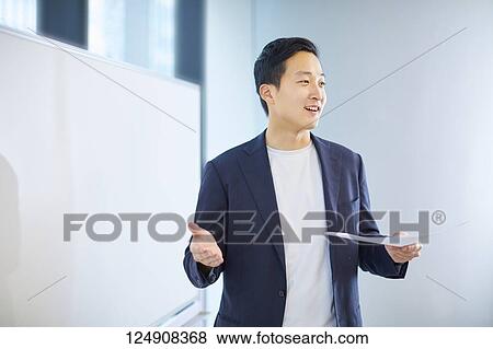 Japanese businessman in the office View Large Photo Image Stock Photo - Japanese businessman in the office. Fotosearch