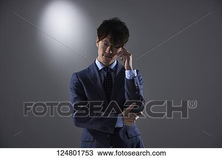 Japanese businessman studio portrait View Large Photo Image Stock Image - Japanese businessman studio portrait. Fotosearch