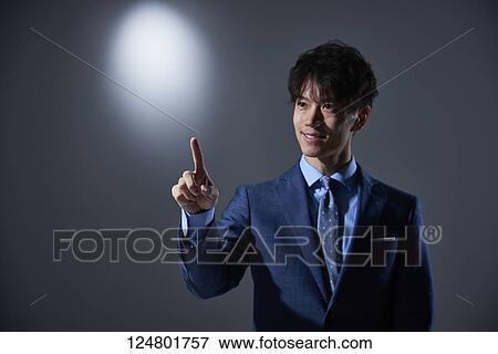 Stock Photo - Japanese businessman studio portrait. Fotosearch