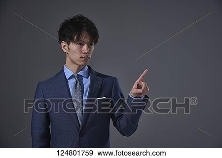 Japanese businessman studio portrait View Large Photo Image Stock Photo - Japanese businessman studio portrait. Fotosearch