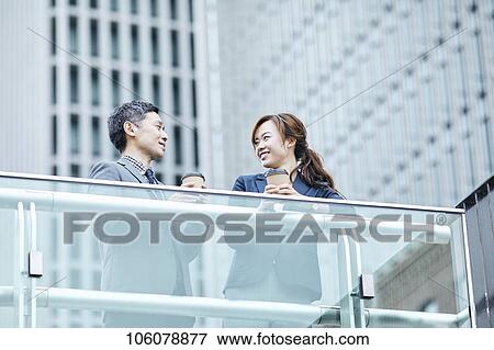 Japanese businesspeople downtown View Large Photo Image Stock Photo - Japanese businesspeople downtown. Fotosearch
