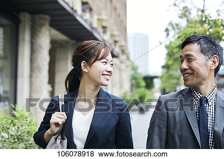 Japanese businesspeople downtown View Large Photo Image Stock Photo - Japanese businesspeople downtown. Fotosearch