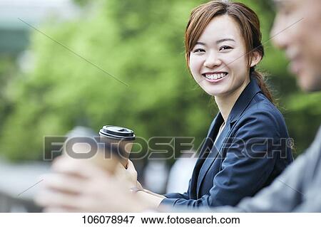 Japanese businesspeople downtown View Large Photo Image Stock Photo - Japanese businesspeople downtown. Fotosearch