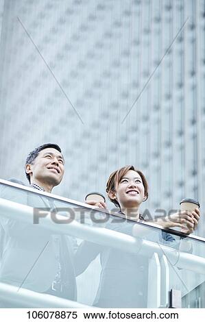 Japanese businesspeople downtown View Large Photo Image Stock Photography - Japanese businesspeople downtown. Fotosearch