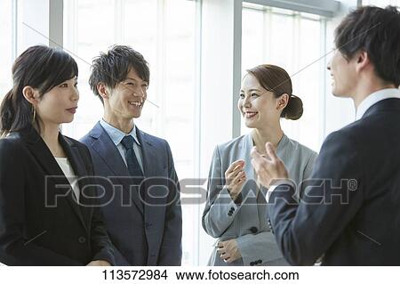Japanese businesspeople in a meeting View Large Photo Image Picture - Japanese businesspeople in a meeting. Fotosearch