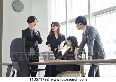 Japanese businesspeople in a meeting View Large Photo Image Stock Image - Japanese businesspeople in a meeting. Fotosearch
