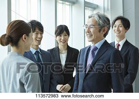 Japanese businesspeople in a meeting View Large Photo Image Stock Image - Japanese businesspeople in a meeting. Fotosearch