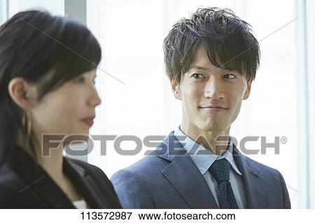 Japanese businesspeople in a meeting View Large Photo Image Stock Photo - Japanese businesspeople in a meeting. Fotosearch