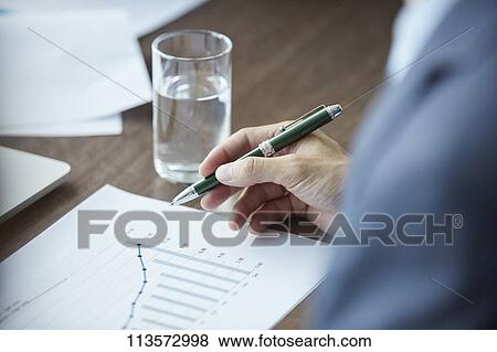 Stock Photo - Japanese businesspeople in a meeting. Fotosearch