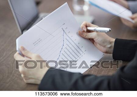 Japanese businesspeople in a meeting View Large Photo Image Stock Photograph - Japanese businesspeople in a meeting. Fotosearch