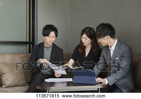 Japanese businesspeople in a meeting View Large Photo Image Stock Photography - Japanese businesspeople in a meeting. Fotosearch