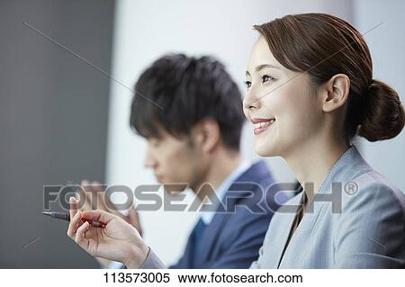 Japanese businesspeople in a meeting View Large Photo Image Stock Photography - Japanese businesspeople in a meeting. Fotosearch
