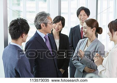Japanese businesspeople in a meeting View Large Photo Image Stock Photography - Japanese businesspeople in a meeting. Fotosearch