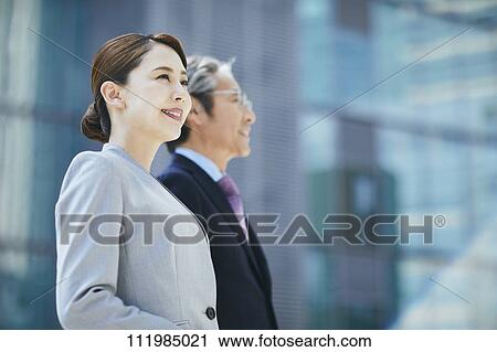 Stock Image - Japanese businesspeople. Fotosearch