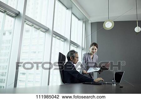 Stock Image - Japanese businesspeople. Fotosearch