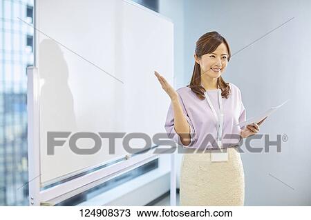 Stock Image - Japanese businesswoman in the office. Fotosearch