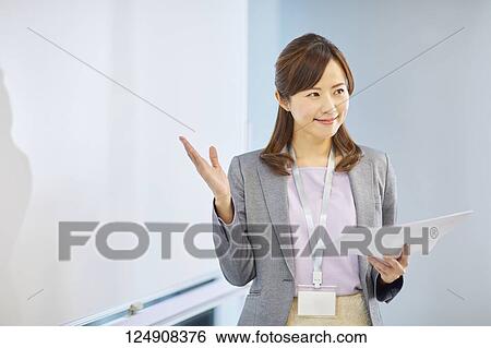 Stock Photograph - Japanese businesswoman in the office. Fotosearch