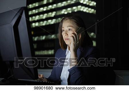 Japanese businesswoman working late at night View Large Photo Image Stock Image - Japanese businesswoman working late at night. Fotosearch