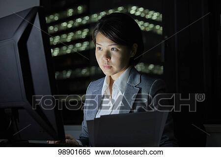 Japanese businesswoman working late at night View Large Photo Image Stock Photography - Japanese businesswoman working late at night. Fotosearch