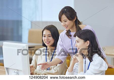 Japanese businesswomen in the office View Large Photo Image Picture - Japanese businesswomen in the office. Fotosearch