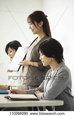 Japanese businesswomen in the office View Large Photo Image Stock Image - Japanese businesswomen in the office. Fotosearch