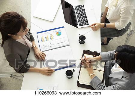 Japanese businesswomen in the office View Large Photo Image Stock Image - Japanese businesswomen in the office. Fotosearch