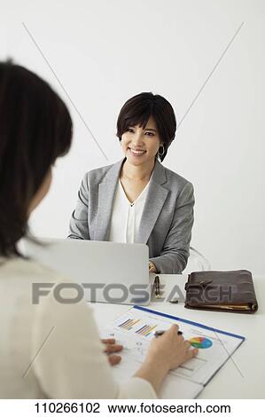 Japanese businesswomen in the office View Large Photo Image Stock Image - Japanese businesswomen in the office. Fotosearch
