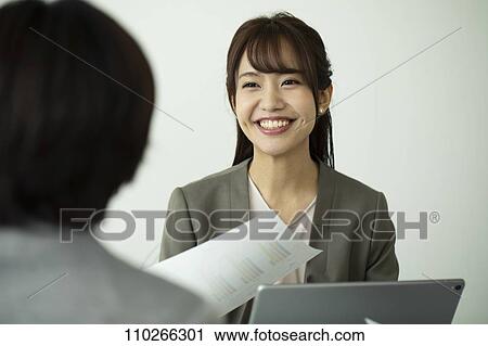 Japanese businesswomen in the office View Large Photo Image Stock Image - Japanese businesswomen in the office. Fotosearch