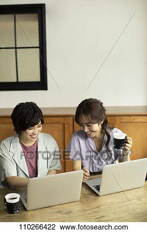 Japanese businesswomen in the office View Large Photo Image Stock Image - Japanese businesswomen in the office. Fotosearch