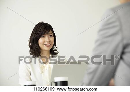 Stock Photo - Japanese businesswomen in the office. Fotosearch