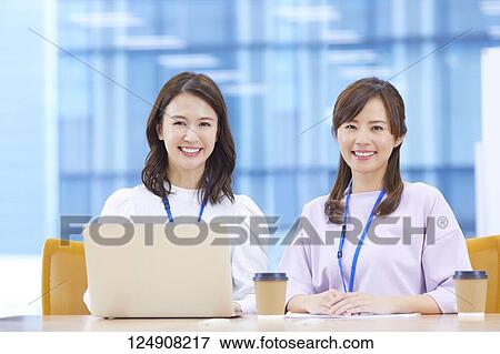 Japanese businesswomen in the office View Large Photo Image Stock Photo - Japanese businesswomen in the office. Fotosearch