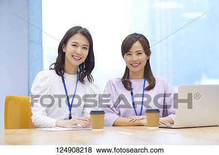 Japanese businesswomen in the office View Large Photo Image Stock Photo - Japanese businesswomen in the office. Fotosearch
