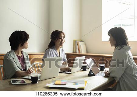 Japanese businesswomen in the office View Large Photo Image Stock Photography - Japanese businesswomen in the office. Fotosearch