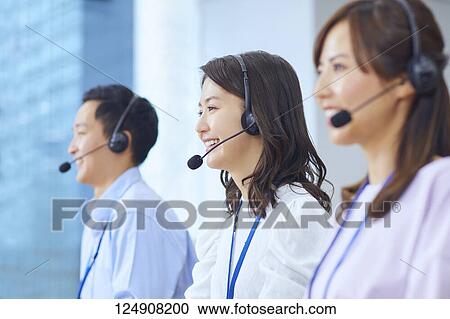 Stock Image - Japanese call center. Fotosearch