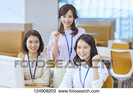 Stock Image - Japanese call center. Fotosearch
