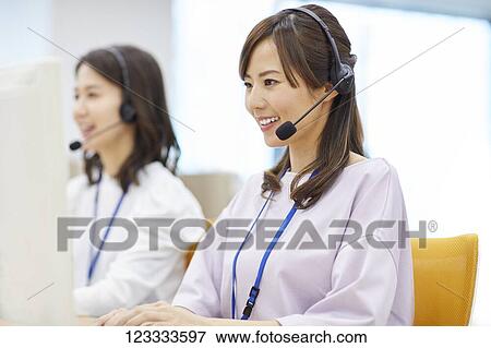 Japanese call center View Large Photo Image Stock Photo - Japanese call center. Fotosearch