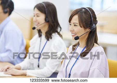 Stock Photo - Japanese call center. Fotosearch