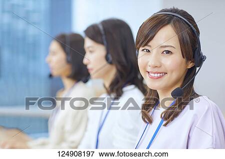 Japanese call center View Large Photo Image Stock Photo - Japanese call center. Fotosearch