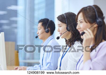Japanese call center View Large Photo Image Stock Photo - Japanese call center. Fotosearch