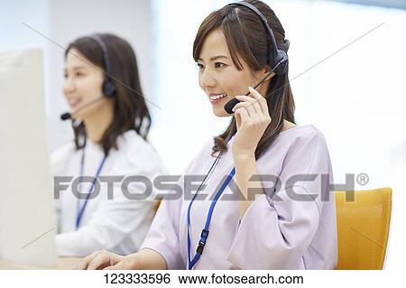 Japanese call center View Large Photo Image Stock Photograph - Japanese call center. Fotosearch