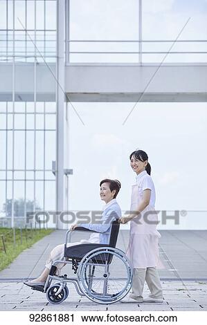 Japanese caretaker helping senior patient View Large Photo Image Stock Image - Japanese caretaker helping senior patient. Fotosearch