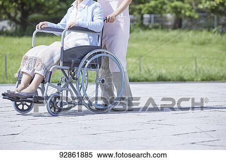 Japanese caretaker helping senior patient View Large Photo Image Stock Photography - Japanese caretaker helping senior patient. Fotosearch