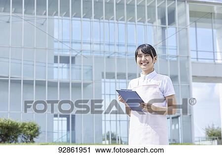 Stock Image - Japanese caretaker. Fotosearch