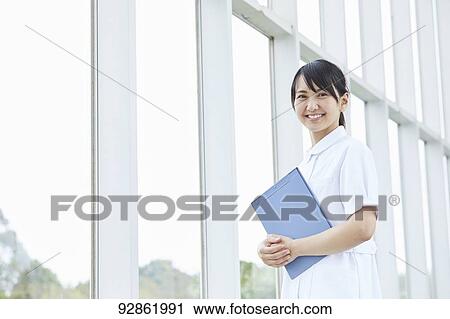 Stock Image - Japanese caretaker. Fotosearch