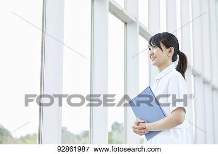Stock Photo - Japanese caretaker. Fotosearch