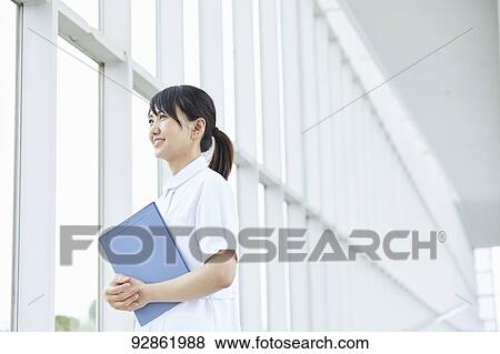 Stock Photo - Japanese caretaker. Fotosearch