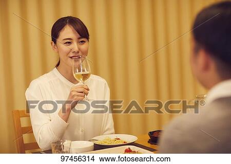Picture - Japanese couple at home. Fotosearch